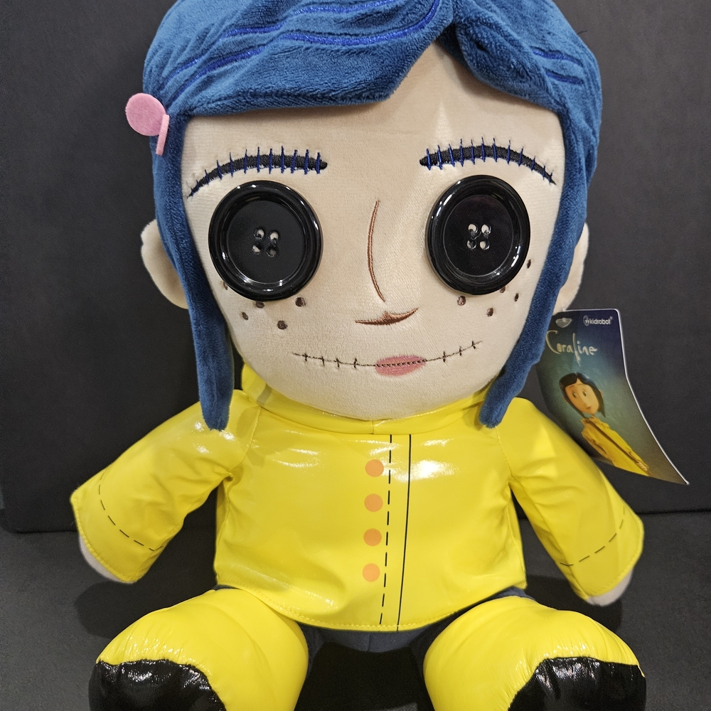 Blue-Haired Plush Doll with Yellow Coat